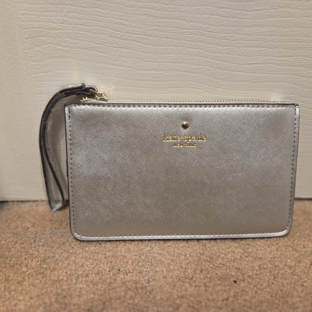Kate Spade Metillic Silver and Cream Interior Wristlet